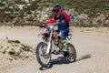 Professional Motocross Motorcycle Rider Drives Over the Road Track.