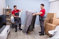 Professional Movers Doing Home Relocation Royalty Free Stock Photo