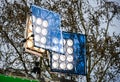 Professional movie light system with blue filter on outdoor set. Royalty Free Stock Photo