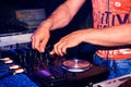 Professional music equipment for playing and control music in nightclub with hands DJ