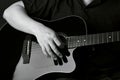 Professional musician playing acoustic guitar in music recording Royalty Free Stock Photo