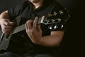 Professional musician playing acoustic guitar in music recording Royalty Free Stock Photo