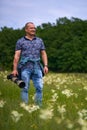 Professional nature photographer in the field Royalty Free Stock Photo