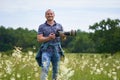 Professional nature photographer in the field Royalty Free Stock Photo