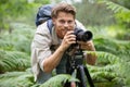 professional nature photographer using tripod Royalty Free Stock Photo