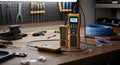 Professional network cable tester kit successfully confirming continuity and pass status on workbench Royalty Free Stock Photo
