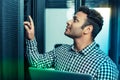 Professional nice man checking the server system Royalty Free Stock Photo