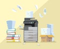 Professional office dark gray copier, multifunction scanner printer printing paper documents with pile of documents, stack of Royalty Free Stock Photo