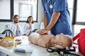 professional paramedic in blue uniform doing Royalty Free Stock Photo