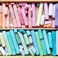 Professional pastel crayons in wooden artist box closeup, top vi Royalty Free Stock Photo