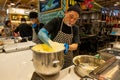 Pastry chef prepares ingredients for cakes