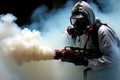 Professional pest control technician in protective suit spraying poisonous gas to eliminate pests