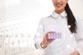 Professional pharmacist with pills and periodic table Royalty Free Stock Photo