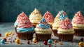 Professional photo of delicious various cupcakes with cream on top