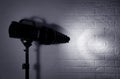 Professional photo studio lighting equipment near brick wall Royalty Free Stock Photo