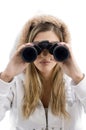 Professional photographer eyeing with binoculars Royalty Free Stock Photo