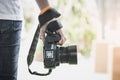 Professional photographer landscape with dslr camera in smart woman hands for ready to take pictures, Photographers takes