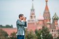 Professional photographer man taking a city photo