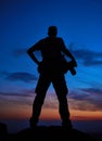 Professional photographer silhouette at sunset or sunrise Royalty Free Stock Photo