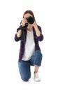 Professional photographer taking picture on white Royalty Free Stock Photo