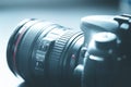 Professional photographing: Reflex camera with telephoto lens, cutout Royalty Free Stock Photo