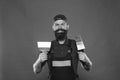 Professional plasterer. Skillful plasterer. Successful renovation. Repair success. Bearded man worker with plastering Royalty Free Stock Photo