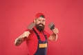 Professional plasterer. Skillful plasterer. Successful renovation. Repair success. Bearded man worker with plastering