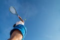 Professional player doing a tennis kick on court in the afternoon. Royalty Free Stock Photo