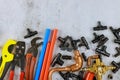 Water supply kit tools for cutting polypropylene pipes, plastic corners, wrench, work gloves Royalty Free Stock Photo