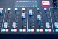 Professional podcast mixing console with faders and adjusting buttons, Audio sound mixer console. Sound mixing desk. Music mixer c Royalty Free Stock Photo