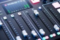 Professional podcast mixing console with faders and adjusting buttons, Audio sound mixer console. Sound mixing desk. Music mixer c Royalty Free Stock Photo