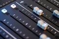 Professional podcast mixing console with faders and adjusting buttons, Audio sound mixer console. Sound mixing desk. Music mixer c Royalty Free Stock Photo