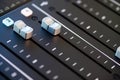 Professional podcast mixing console with faders and adjusting buttons, Audio sound mixer console. Sound mixing desk. Music mixer c Royalty Free Stock Photo