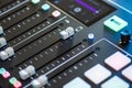 Professional podcast mixing console with faders and adjusting buttons, Audio sound mixer console. Sound mixing desk. Music mixer c Royalty Free Stock Photo