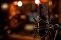 professional podcast studio, microphone , inviting atmosphere for recording and broadcasting Royalty Free Stock Photo