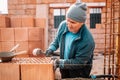 Professional portrait of industrial worker, bricklayer and mason Royalty Free Stock Photo