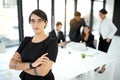 Professional, portrait of woman in meeting with confidence for leader or manager and team in office. Pride, person and Royalty Free Stock Photo