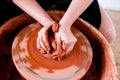 Professional potter making bowl in pottery workshop Royalty Free Stock Photo