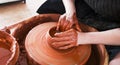 Professional potter making bowl in pottery workshop Royalty Free Stock Photo