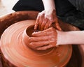 Professional potter making bowl in pottery workshop Royalty Free Stock Photo