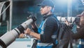 Professional Press Officer, Sports Photographers with Camera with Zoom Lens Shooting Football Royalty Free Stock Photo