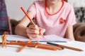 Professional psychologist with a teenage girl. Disclosing a child through a drawing. The method of work of a child psychotherapist