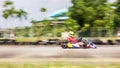 Professional racer racing on a race track with his go-kart Royalty Free Stock Photo