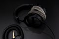 Professional recording studio headphones on a black background. Close-up shot Royalty Free Stock Photo