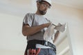 Professional repairman wearing protective gloves Royalty Free Stock Photo