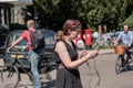 Professional reporter and news reader using a radio station microphone.