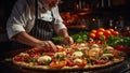 A professional restaurant chef prepares pizza from different ingredients