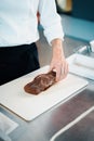 Professional restaurant kitchen, close-up: raw meat for filet mignon