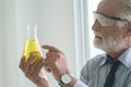 Professional scientist discovery new chemical formula from long research inventions, hand pointing at for science selection Royalty Free Stock Photo