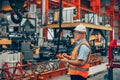 Professional senior engineer male machine operator foreman worker work in heavy industry factory Royalty Free Stock Photo